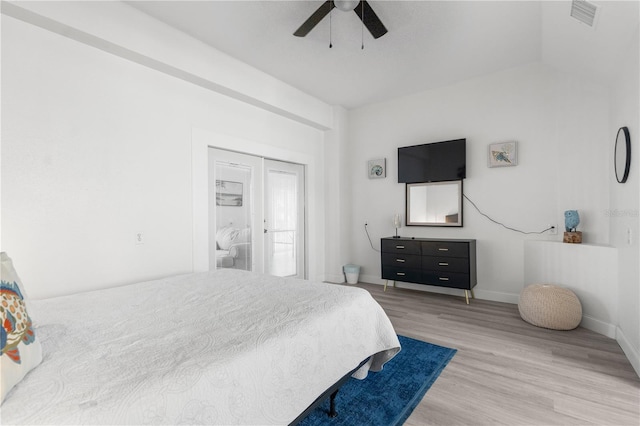 bedroom featuring ceiling fan and light hardwood / wood-style floors