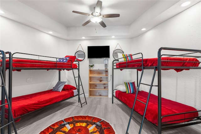 bedroom with light wood-style floors, recessed lighting, and a ceiling fan