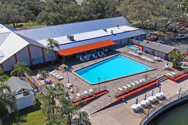 view of swimming pool featuring a patio area