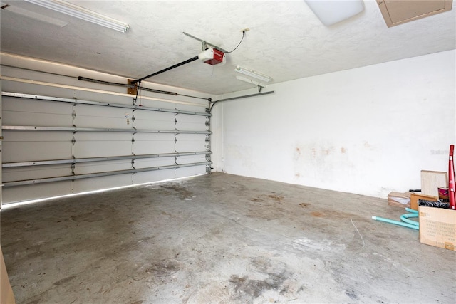 2044 Montana Ave NE, Saint Petersburg, FL 33703 - garage featuring a garage door opener