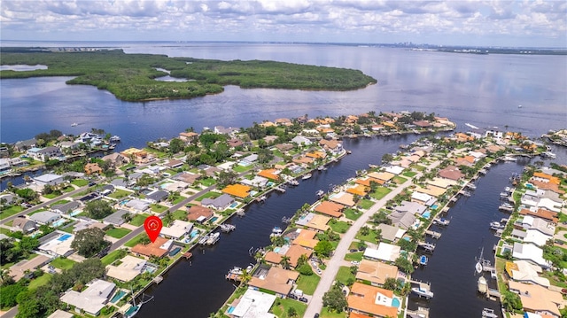 birds eye view of property featuring a water view and a residential view