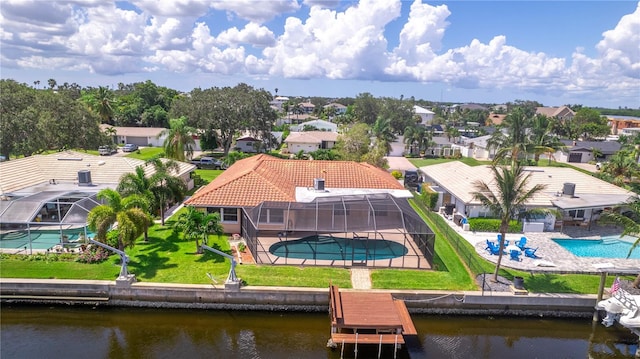 birds eye view of property featuring a water view