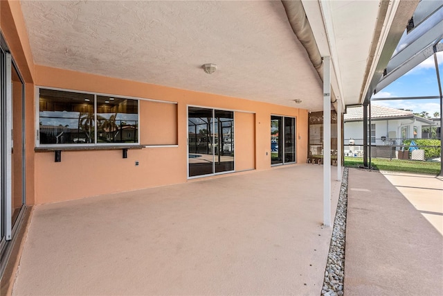 2044 Montana Ave NE, Saint Petersburg, FL 33703 - view of patio / terrace featuring glass enclosure