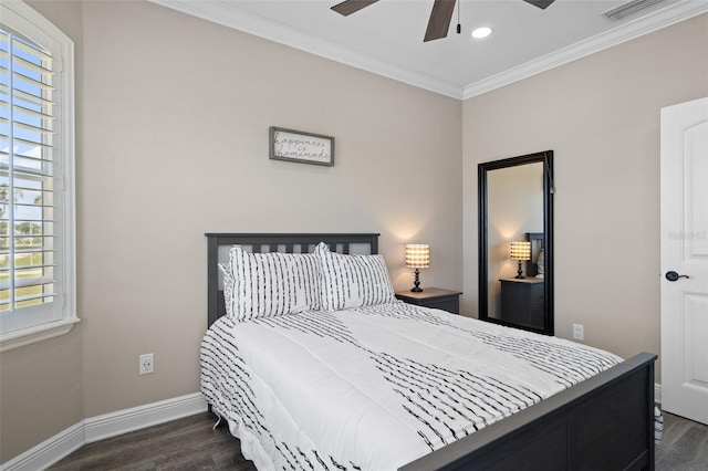 bedroom with ceiling fan, crown molding, and dark hardwood / wood-style floors