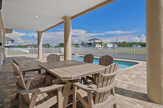 view of patio / terrace featuring a fenced in pool