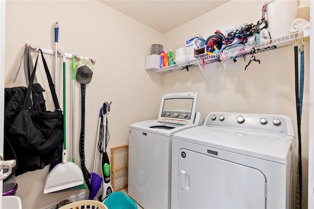 laundry room with washing machine and dryer