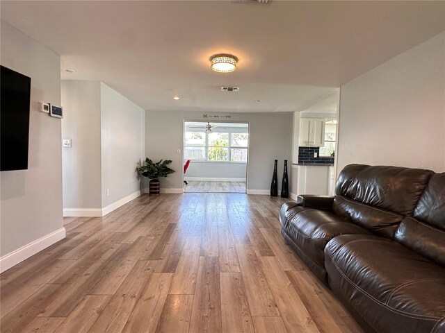 living room featuring light wood-type flooring