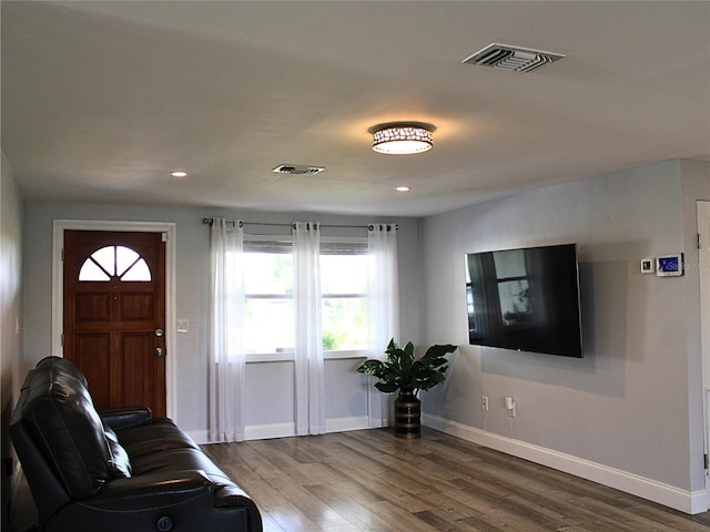 living room with hardwood / wood-style flooring