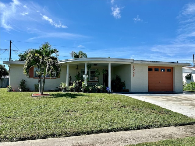 single story home with a front yard and a garage