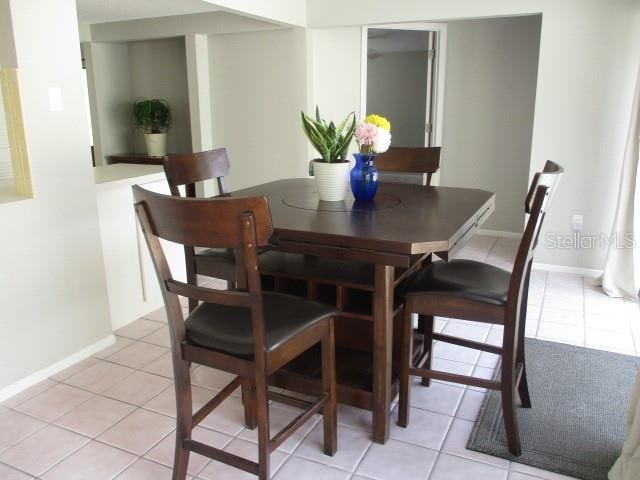 view of tiled dining space