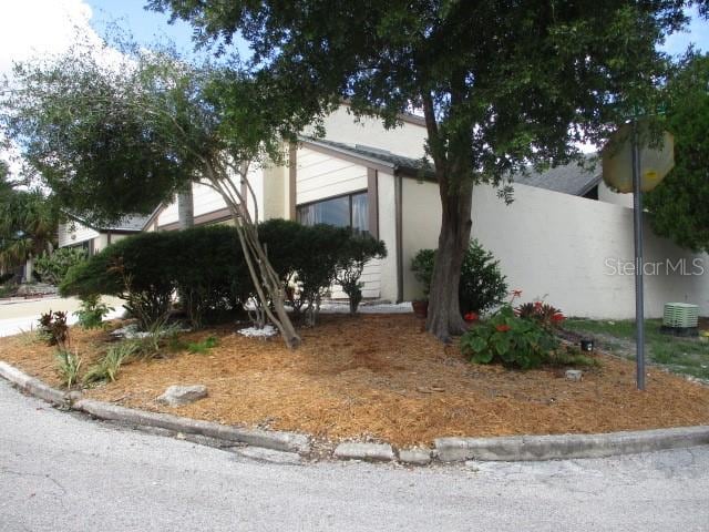 view of front of house featuring central AC