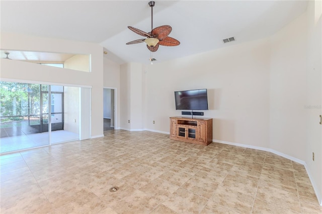 unfurnished living room featuring ceiling fan, high vaulted ceiling, and light tile patterned flooring