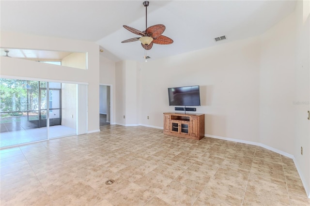 unfurnished living room featuring visible vents, high vaulted ceiling, baseboards, and ceiling fan