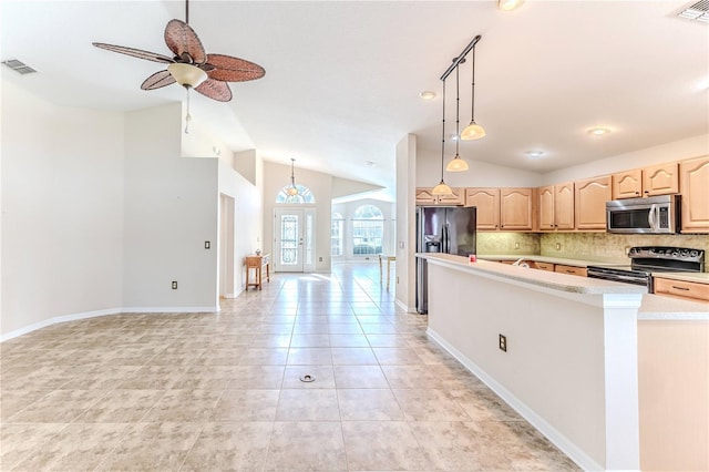 kitchen with ceiling fan, appliances with stainless steel finishes, pendant lighting, and light tile patterned floors