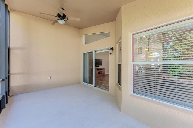 view of patio featuring a ceiling fan