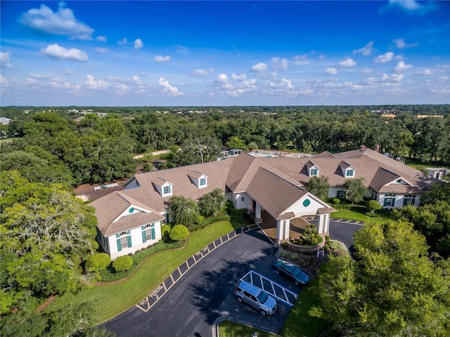 bird's eye view with a forest view