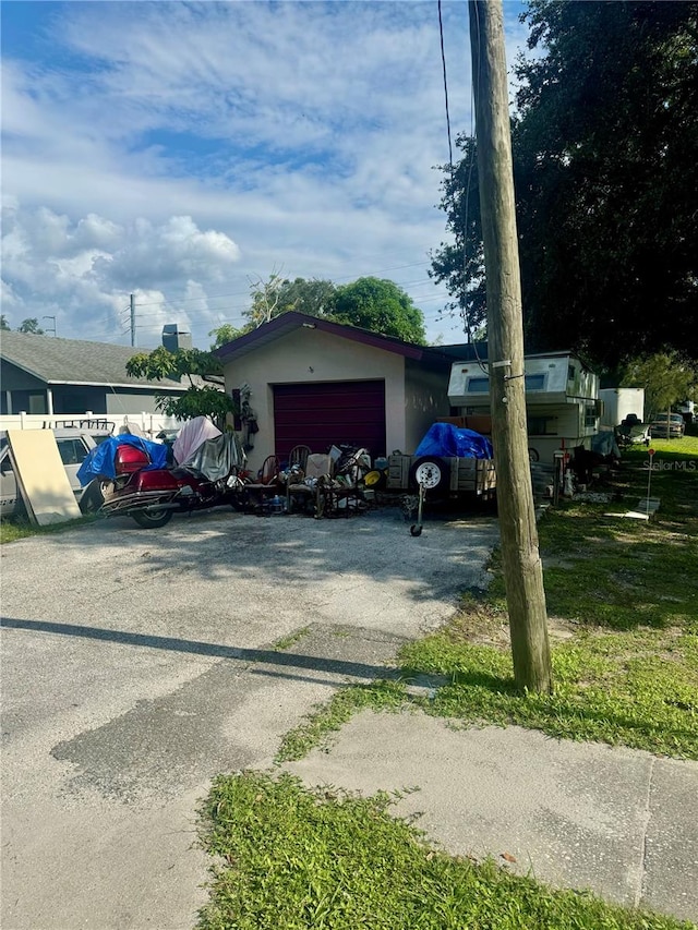 exterior space with a garage