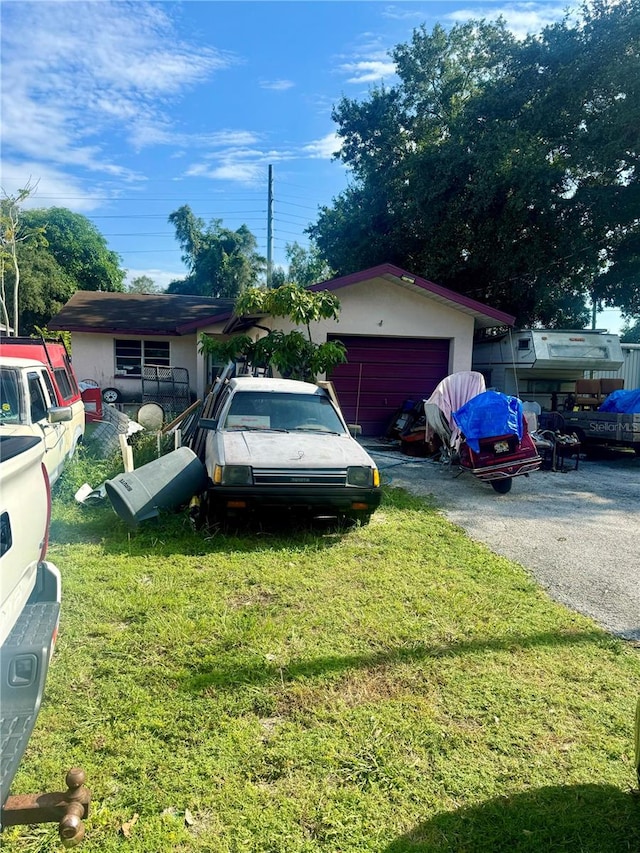 view of yard featuring a garage