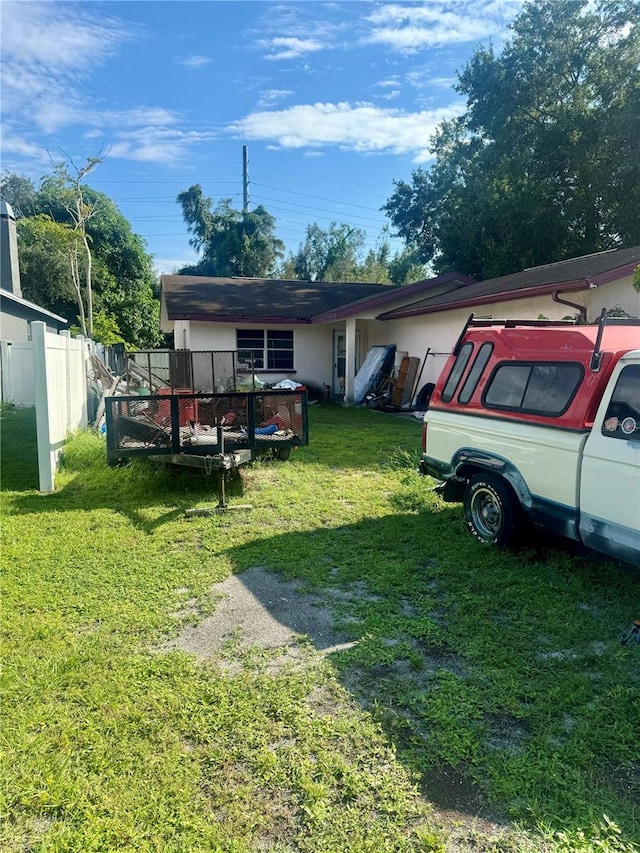 view of yard featuring a wooden deck