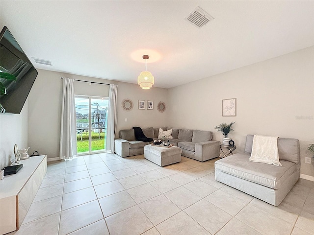 living room with light tile patterned floors