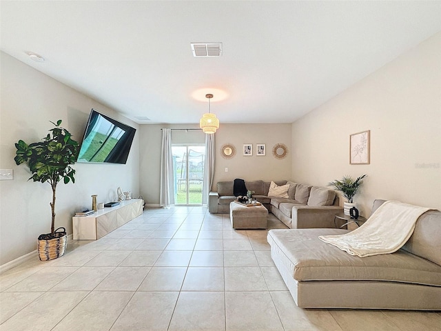 living room featuring light tile patterned flooring