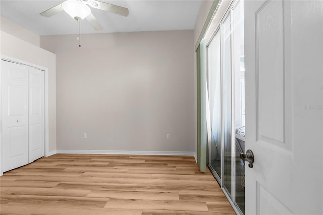 unfurnished bedroom featuring ceiling fan, a closet, and light hardwood / wood-style floors