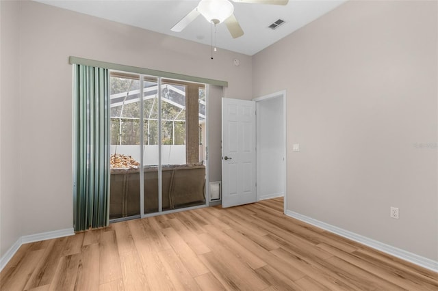 unfurnished room featuring ceiling fan and light hardwood / wood-style floors