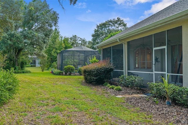 view of yard featuring a sunroom