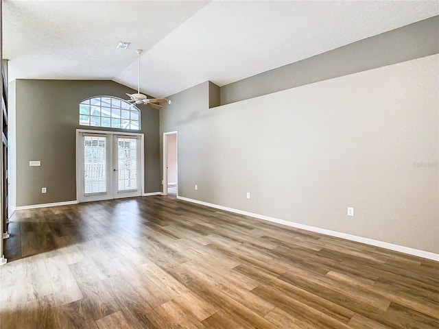 entryway with ceiling fan, french doors, wood finished floors, and baseboards