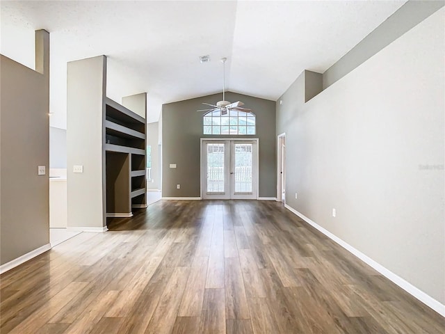 entryway featuring ceiling fan, baseboards, wood finished floors, and french doors