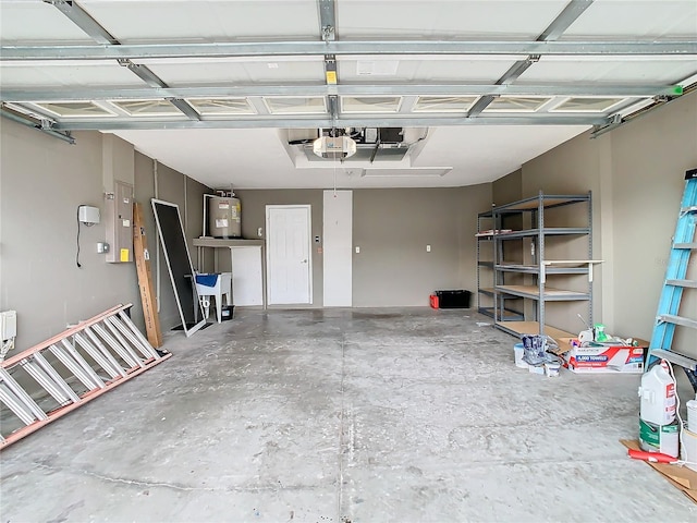 garage with a garage door opener and water heater