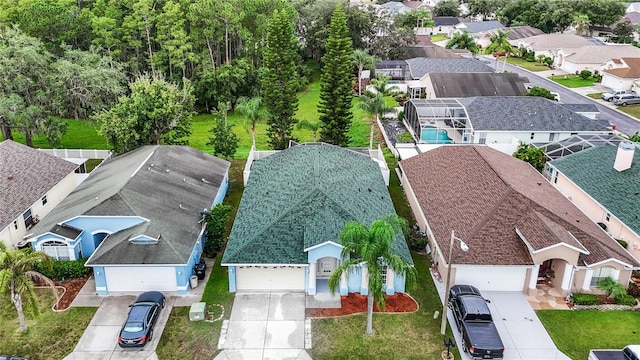 birds eye view of property with a residential view