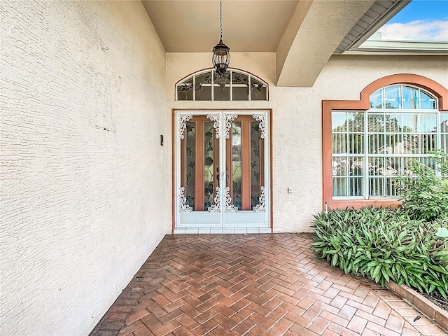 entrance to property featuring french doors