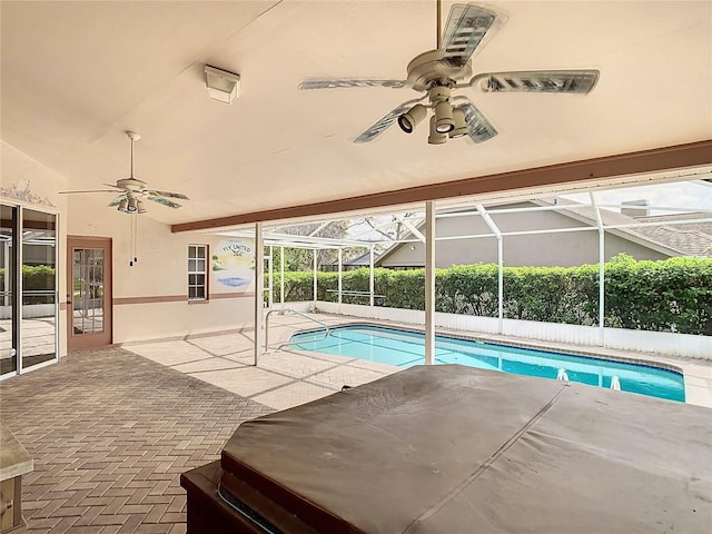 view of swimming pool with a lanai, a patio area, ceiling fan, and a fenced in pool