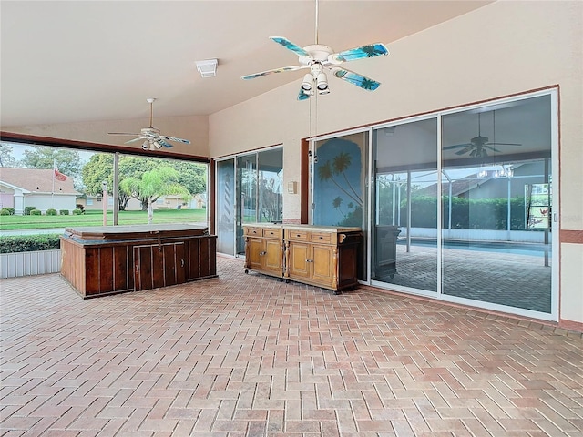 view of patio featuring a hot tub, visible vents, and ceiling fan