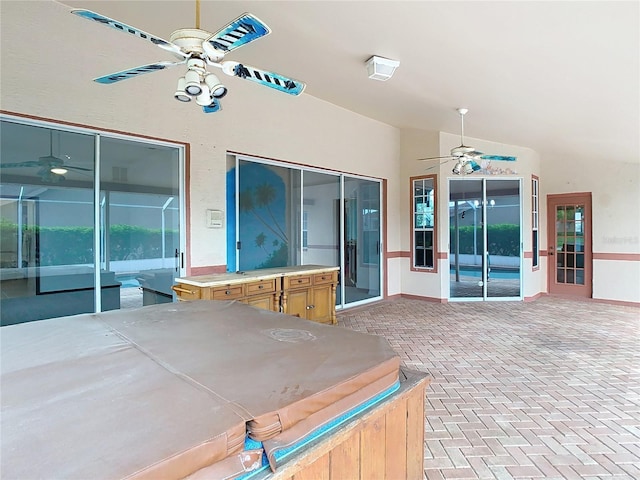 view of patio featuring ceiling fan