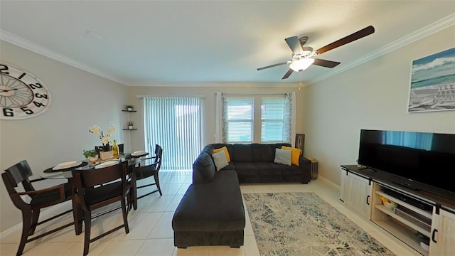 tiled living room with ceiling fan and ornamental molding