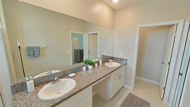 bathroom with vanity and tile patterned floors