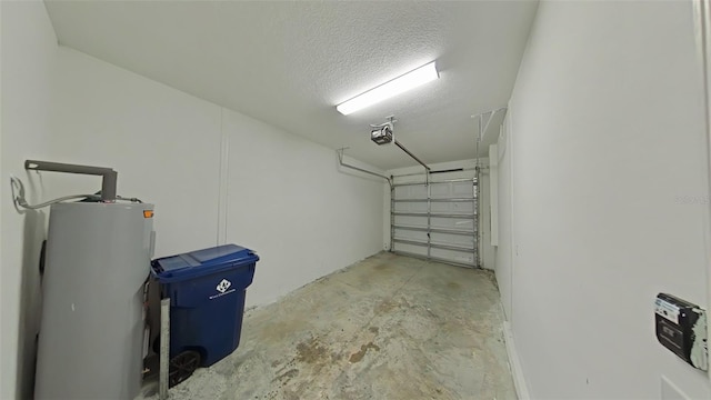 garage featuring a garage door opener and water heater