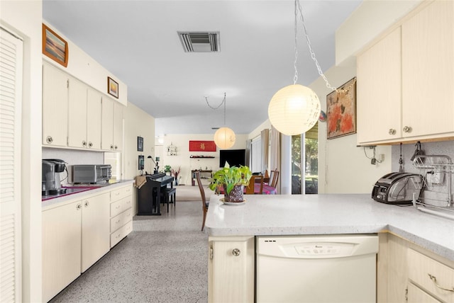 kitchen featuring dishwasher and kitchen peninsula