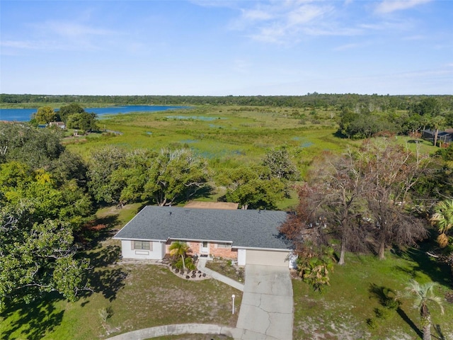 bird's eye view with a water view