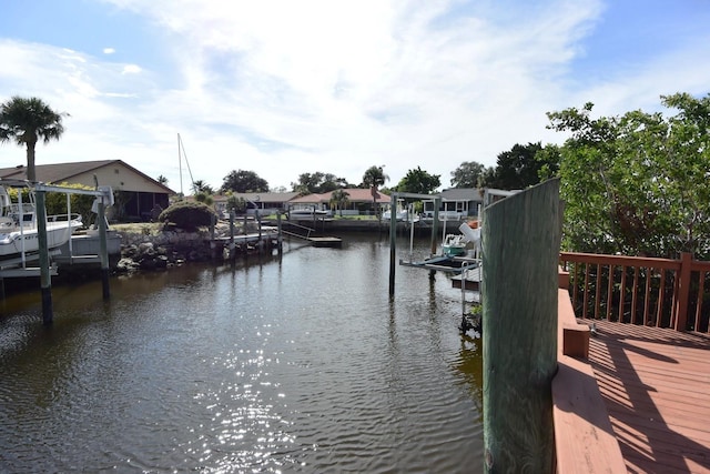 dock area with a water view