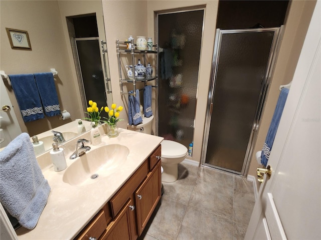 bathroom featuring an enclosed shower, tile patterned flooring, toilet, and vanity