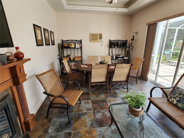 dining area featuring crown molding, ceiling fan, a tray ceiling, and a wall mounted AC