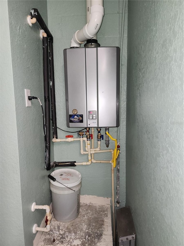 utility room with water heater