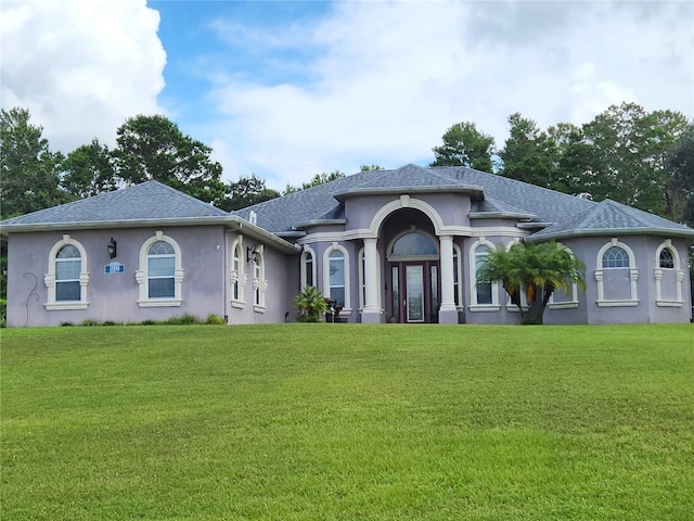 view of front of house with a front lawn