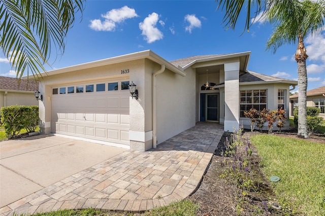 ranch-style house featuring a garage