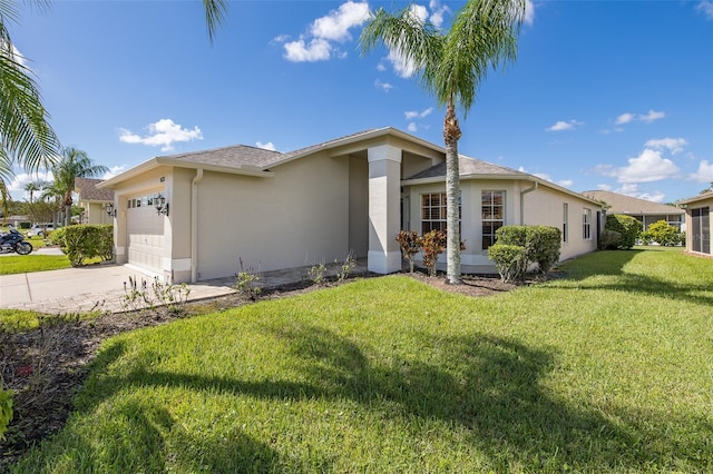 ranch-style house featuring a garage and a front lawn