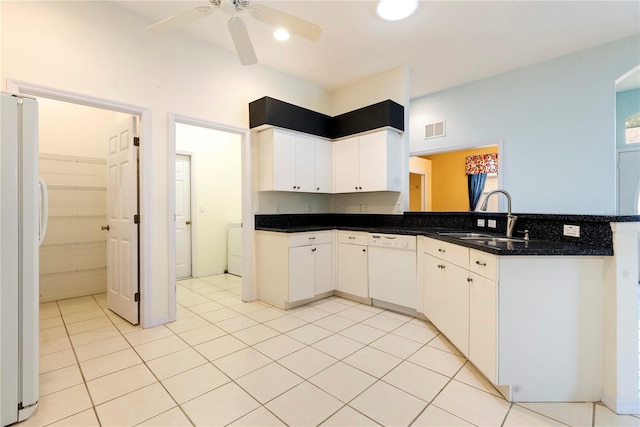 kitchen with light tile patterned floors, white appliances, ceiling fan, and sink