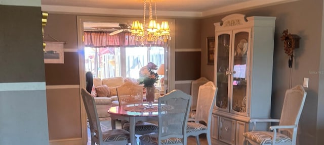 dining space featuring an inviting chandelier